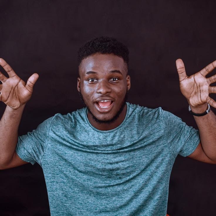 Kaveri Mehta, Lead Design Curator at Cozy Harbor Frame, reviewing corporate floral arrangements